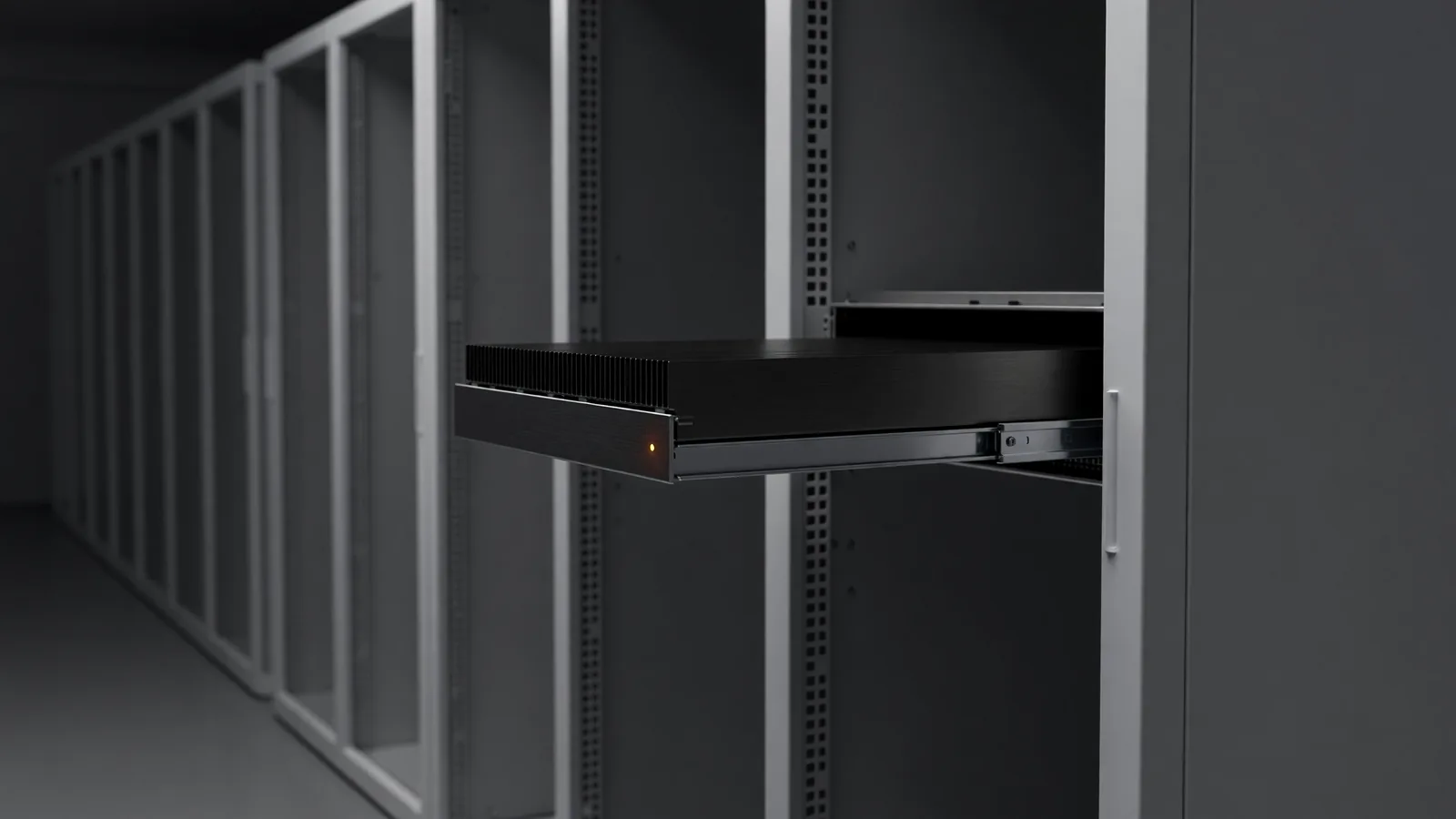 A GPU server tray with dense heatsinks slid out of a rack in a dim colocation aisle, one amber status LED lit — the hardware enclave class NEAR AI Cloud uses for Intel TDX and NVIDIA TEE private inference. Illustration: DeAI